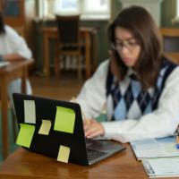 Students studying with laptop